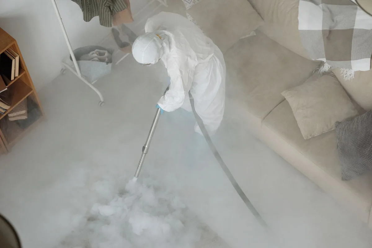 Biohazard cleanup technician in protective equipment, South Creek, WA